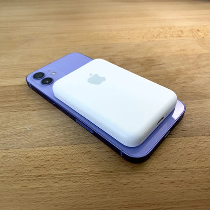 Magnetic Wireless Power Bank Snapped to iPhone Back – Cable-Free Wireless Charging