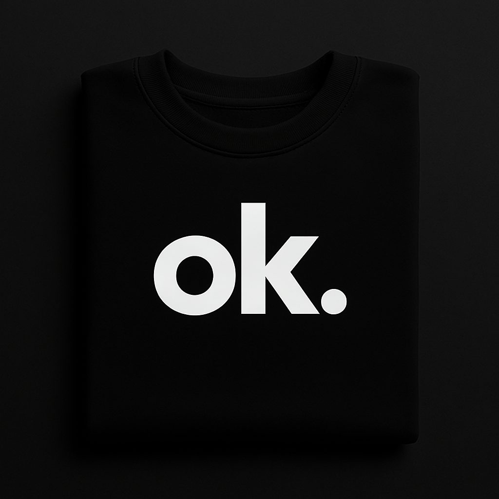 ok. Black T-Shirt – Folded Flat Lay