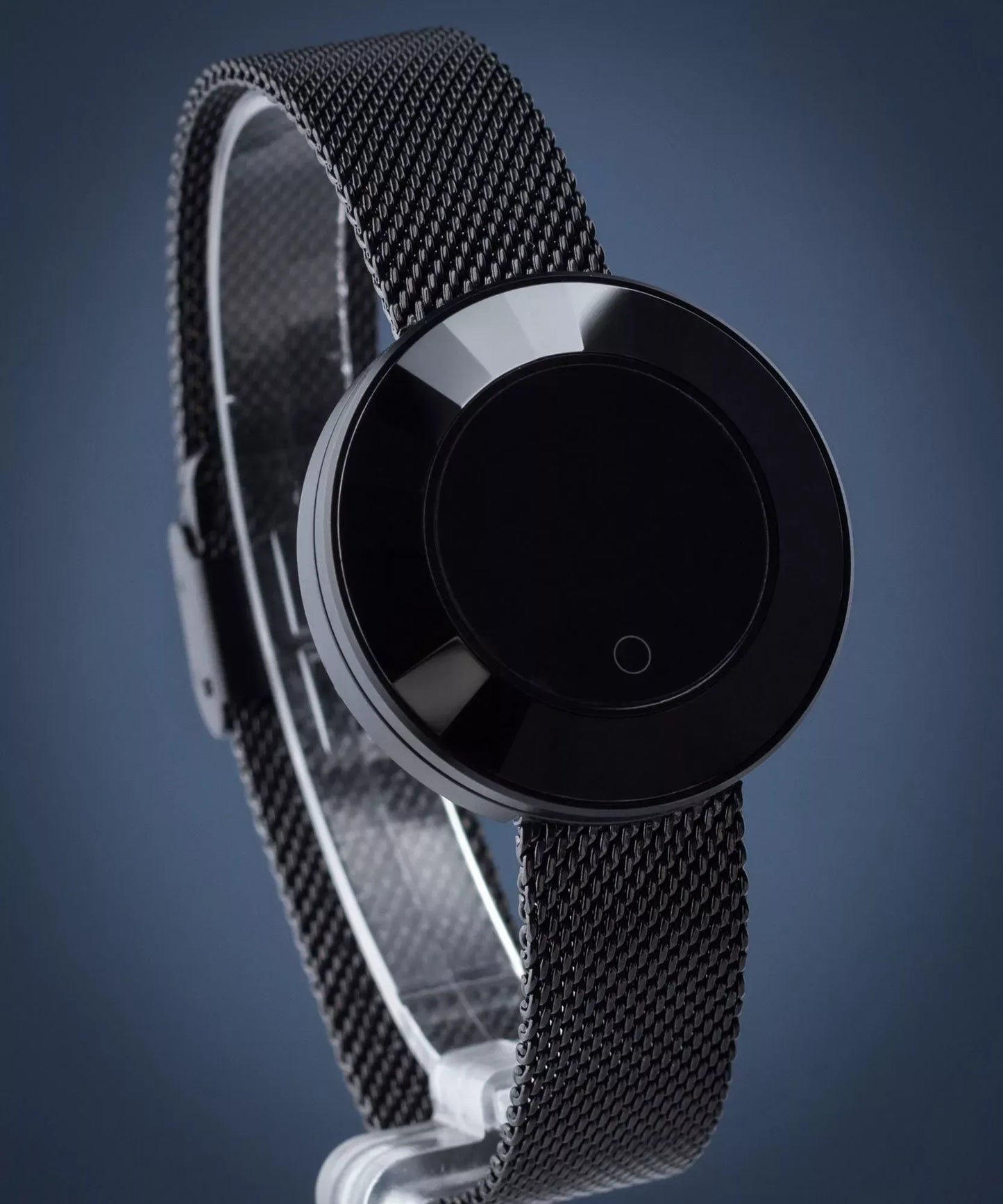 Ladies smart watch black edition – sleek round dial on premium black mesh strap against blue background