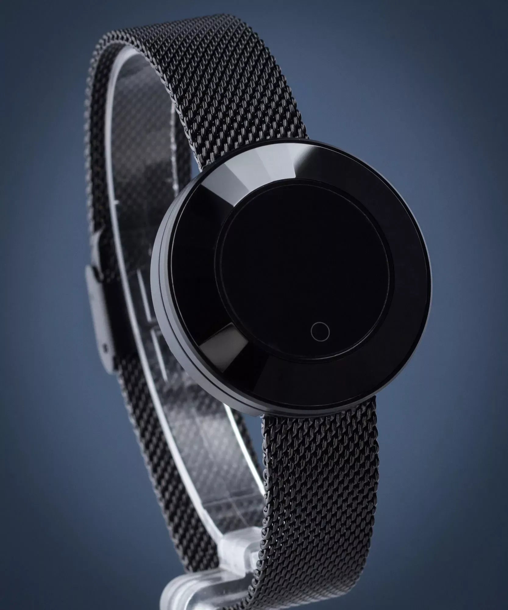 Ladies smart watch black edition – sleek round dial on premium black mesh strap against blue background
