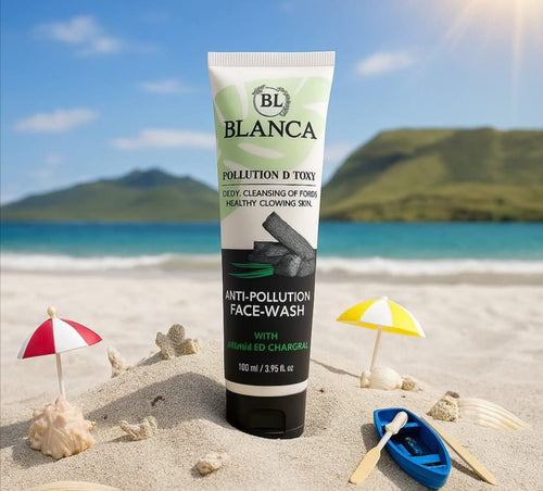 Blanca Pollution D-Toxx Face Wash on beach sand with mini umbrellas and seashells