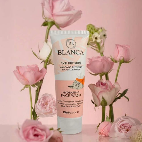Blanca Anti Dry Skin Hydrating Face Wash 100ml with pink roses on pink background – premium lifestyle shot