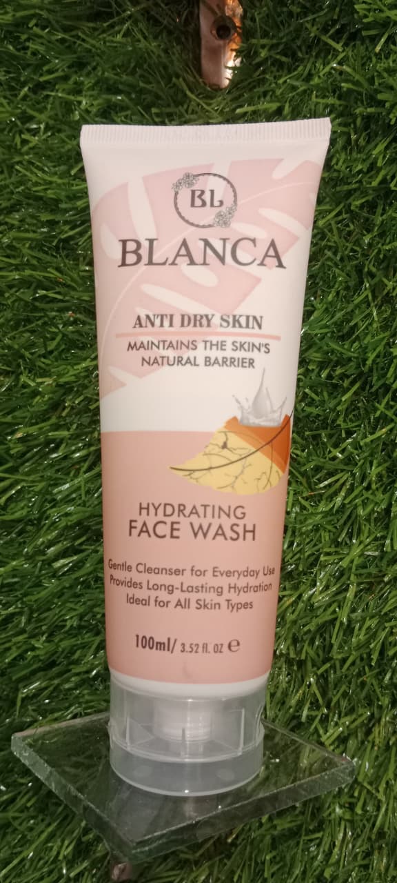 Blanca Anti Dry Skin Hydrating Face Wash 100ml on green grass surface – outdoor lifestyle shot