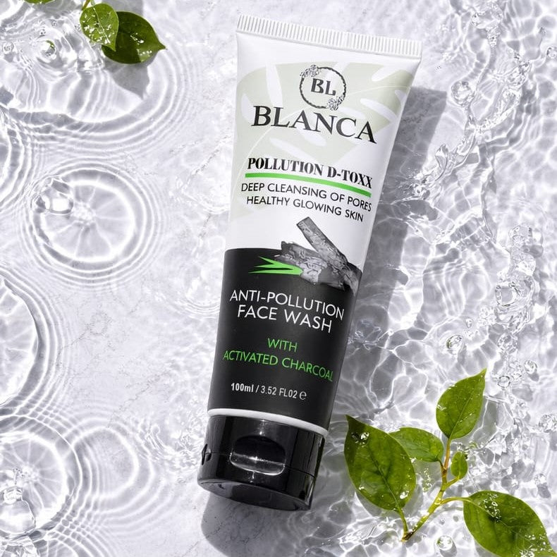 Blanca Pollution D-Toxx Face Wash floating in water with green leaves fresh lifestyle shot