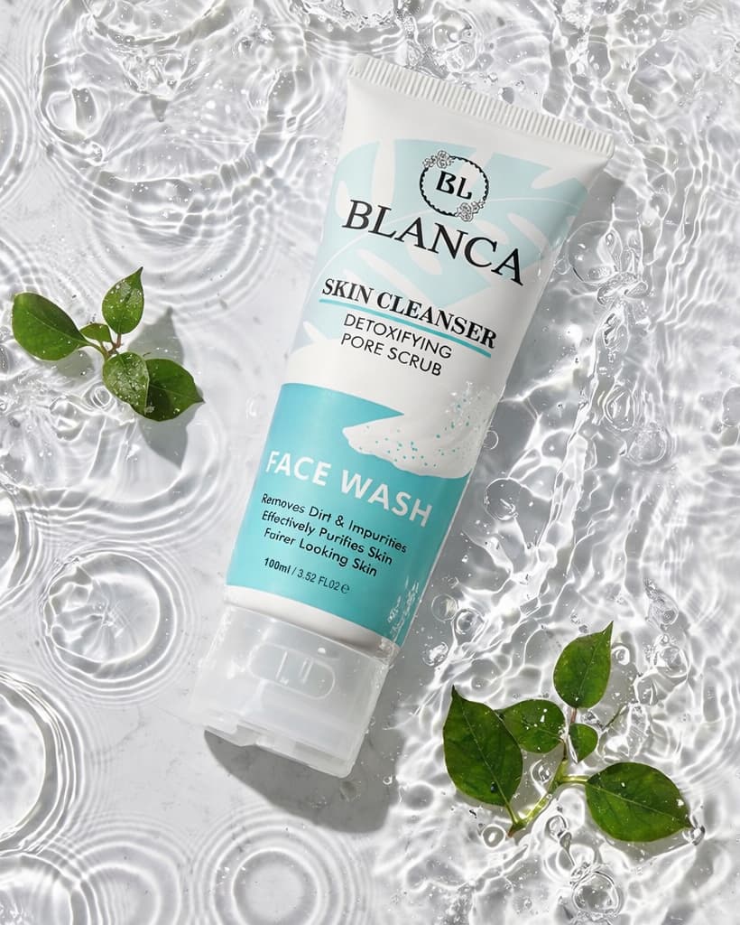 Blanca Skin Cleanser Face Wash 100ml floating in water with green leaves – fresh lifestyle shot