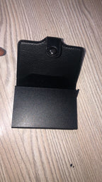 RFID card holder wallet open showing cards and cash - black and brown