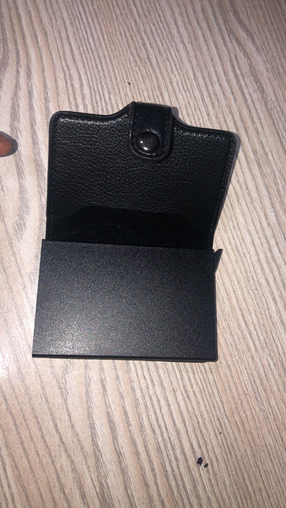 RFID card holder wallet open showing cards and cash - black and brown