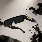 Black rectangular sunglasses dramatic floating shot with black ink splash background
