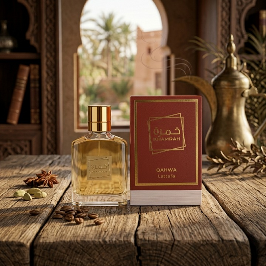 Khamrah Qahwa Lattafa perfume with coffee beans and Arabic dallah in warm light