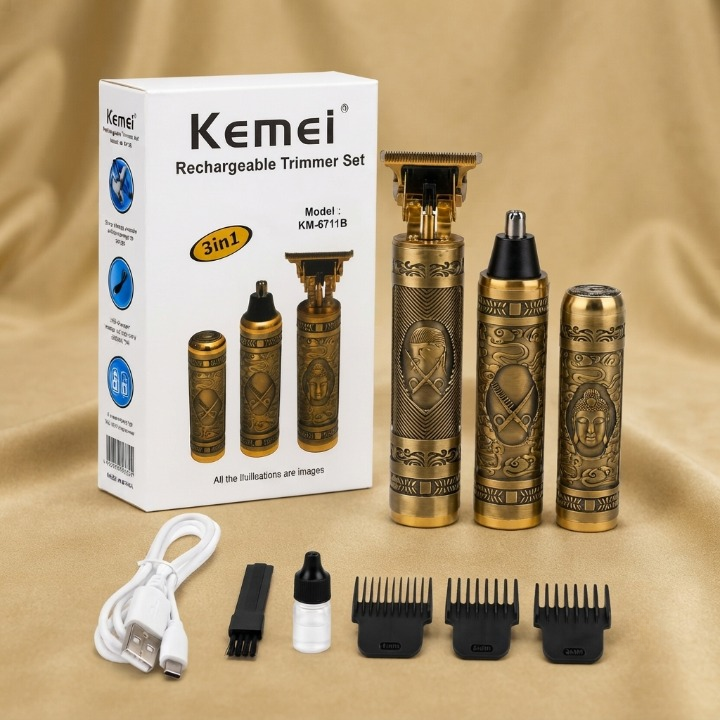 Kemei KM-6711B 3-in-1 Rechargeable Trimmer Set gold antique finish with box showing all 3 tools guide combs cleaning brush oil and USB cable on golden silk background