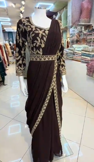 Dark brown heavy embroidered ready-to-wear saree style suit with gold floral blouse and draped skirt – front view on mannequin