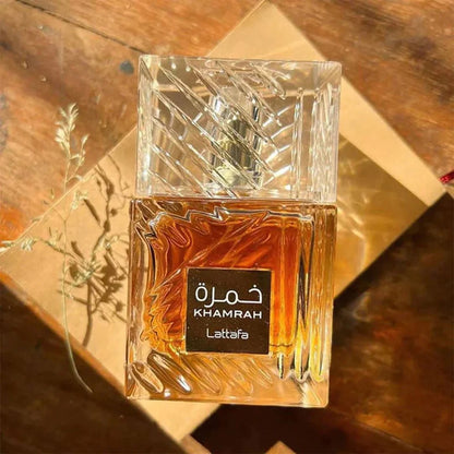 Khamrah Qahwa Lattafa Perfume bottle on beige background
