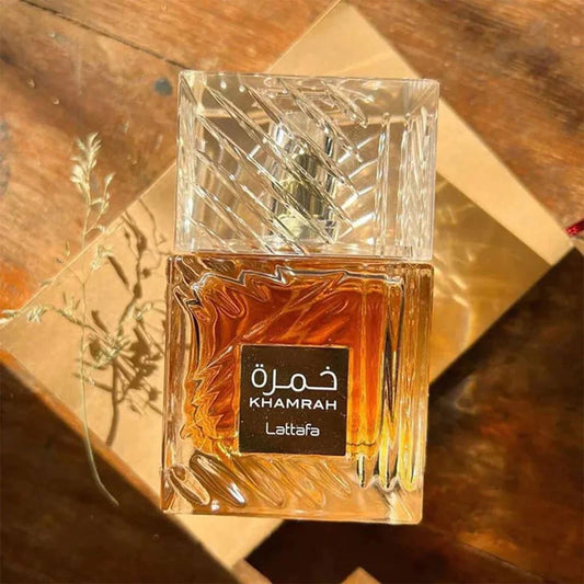 Khamrah Qahwa Lattafa Perfume bottle on beige background