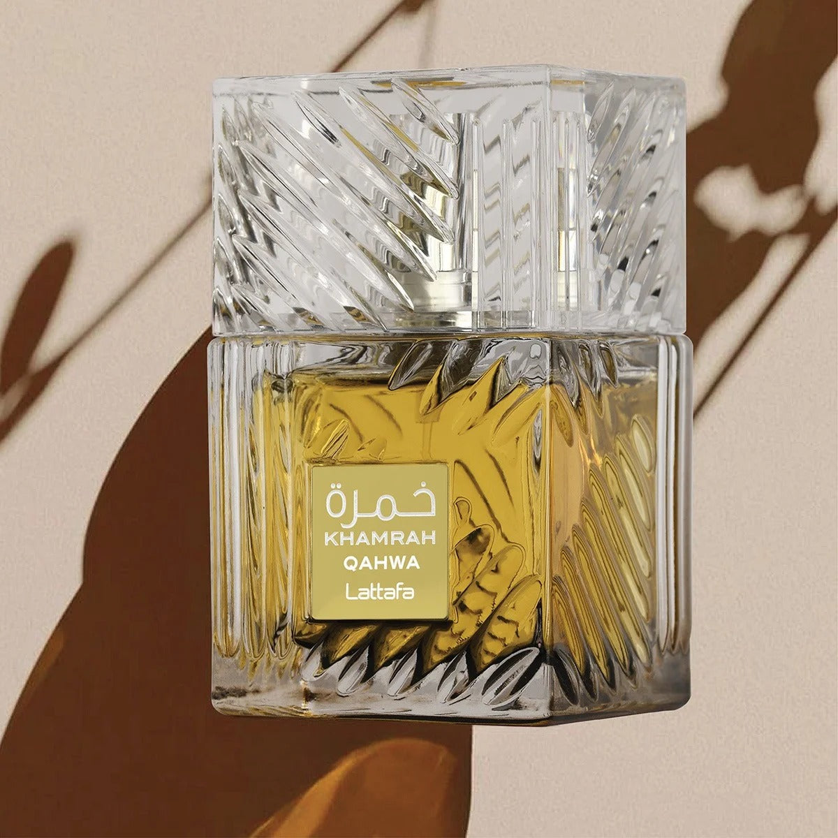 Khamrah Qahwa Lattafa Perfume flat lay on wooden surface