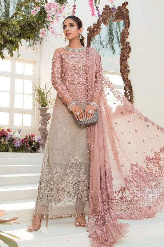 Model wearing pink grey embroidered chiffon suit with dupatta