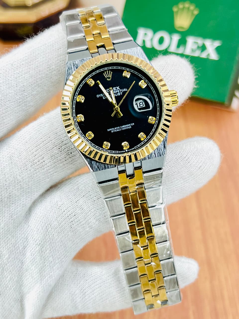 Luxury Semi-Automatic Black Dial Two-Tone Gold Silver Watch – Front View in Hand