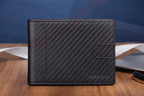 Carbon fiber bifold wallet closed view with snap button closure
