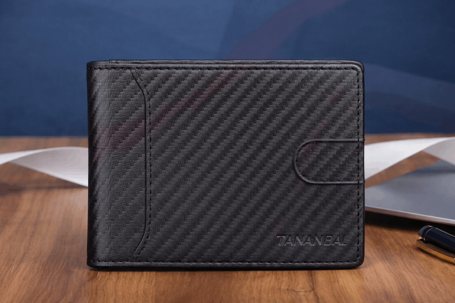 Carbon fiber bifold wallet closed view with snap button closure